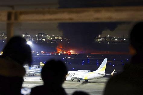 Planes catch fire after a collision at Japan’s Haneda airport, killing 5. Hundreds evacuated safely